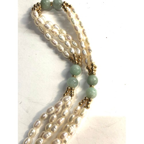 175 - Chinese 14ct gold Jade and fresh water pearl necklace measures approx 62cm long