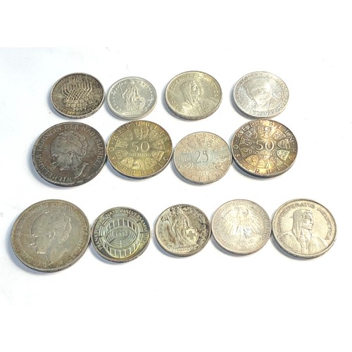 309 - Selection of foreign silver coins 200g