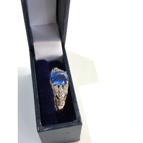 180 - 9ct  gold blue gem set and diamond ring weight 2.8g