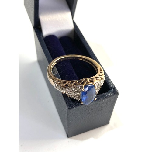 180 - 9ct  gold blue gem set and diamond ring weight 2.8g