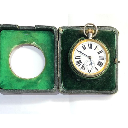 288 - Antique goliath pocket watch in silver front travel case watch winds and ticks but no warranty is gi... 