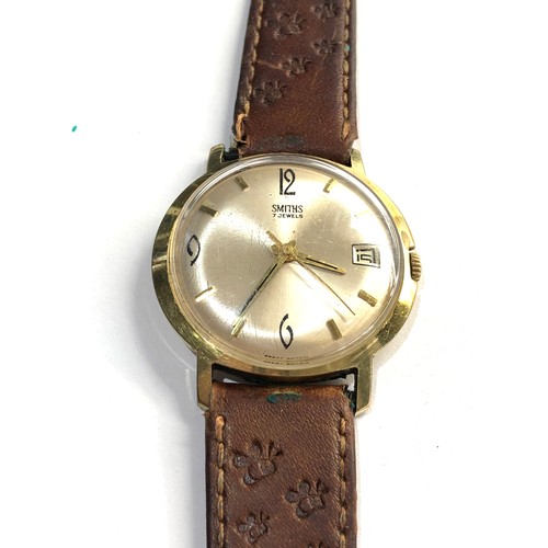 228 - Vintage gents Smiths wristwatch winds and ticks but no warranty given