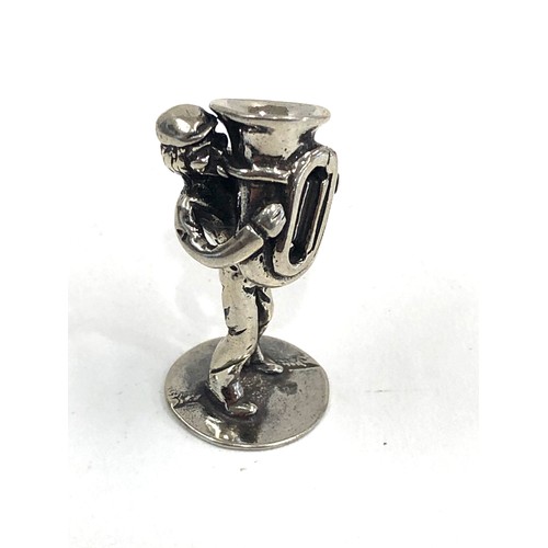 111 - Dutch silver miniature man playing trumpet  dutch sword hallmark