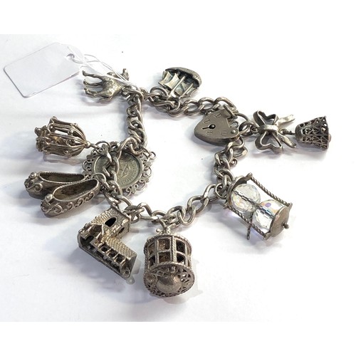 130 - Vintage silver charm bracelet weight 51g