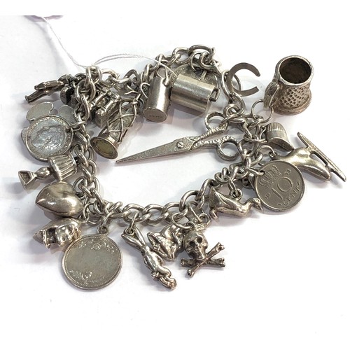 131 - vintage silver charm bracelet weight 68g