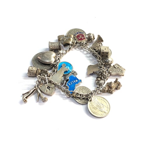 134 - Vintage silver charm bracelet weight 52g