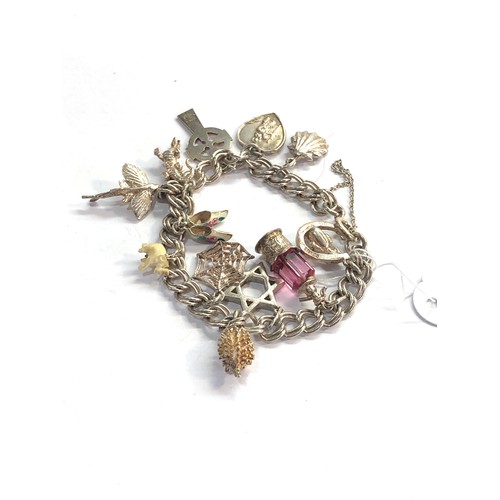 137 - Vintage silver charm bracelet weight 35g