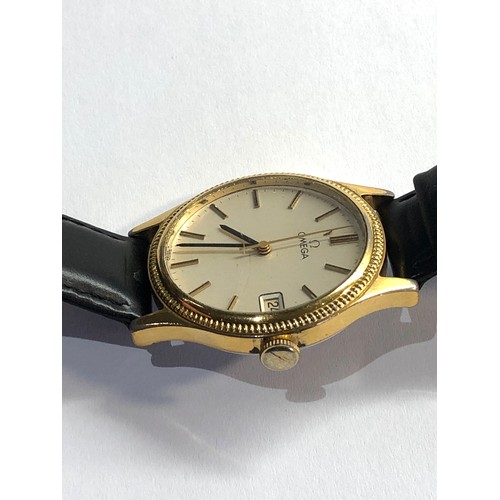 254 - Gents Omega manual wind date wristwatch the watch winds and ticks but no warranty given