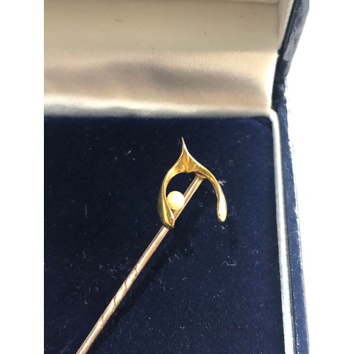 197 - Gold wish bone and pearl stick pin