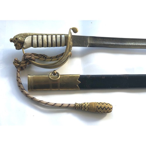 310 - Antique Navy Officer's sword by Manton & Co, with etched blade, brass bowl  and original brass-mount... 