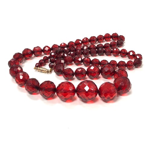 186 - Antique Faceted cherry bakelite bead necklace