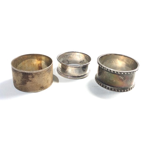 72 - 3 Silver napkin rings