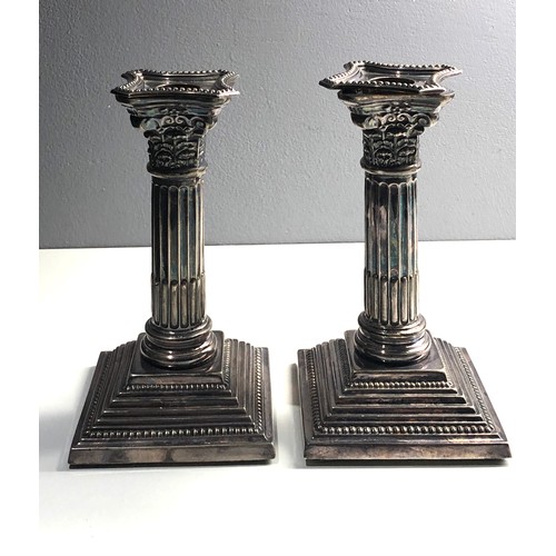 94 - Pair silver corinthian column Candlesticks Birmingham silver hallmarks  height 17cm