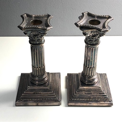 94 - Pair silver corinthian column Candlesticks Birmingham silver hallmarks  height 17cm