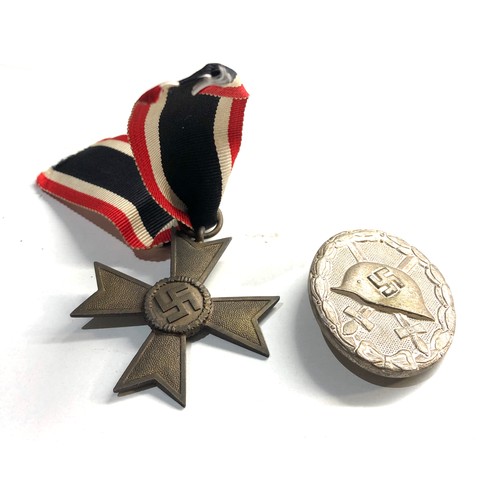 319 - German nazi medal and badge