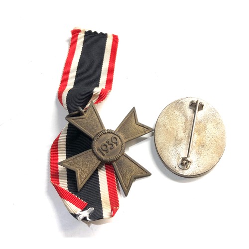 319 - German nazi medal and badge