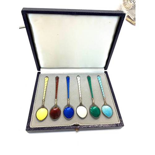 101 - Boxed set of 6 silver and enamel tea spoons