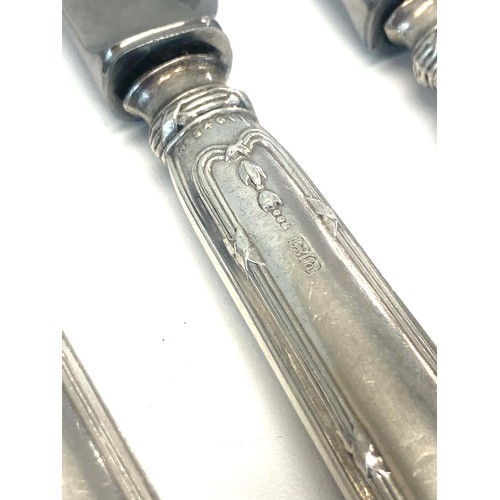 52 - 6 Large silver handled table knives