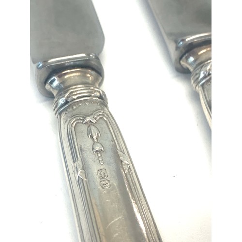 52 - 6 Large silver handled table knives