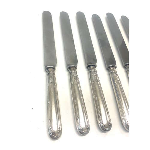 52 - 6 Large silver handled table knives