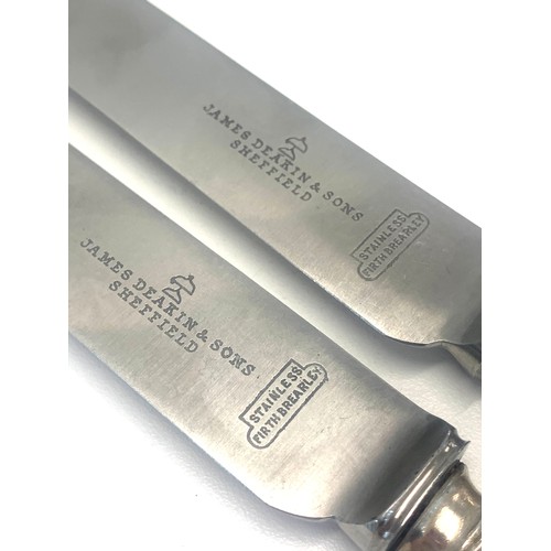 52 - 6 Large silver handled table knives