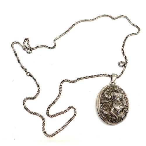 130 - Asian silver locket and chain