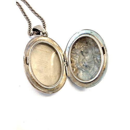 130 - Asian silver locket and chain