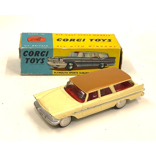 385 - Corgi toys 219 Plymouth sports suburban station wagon   box flap torn