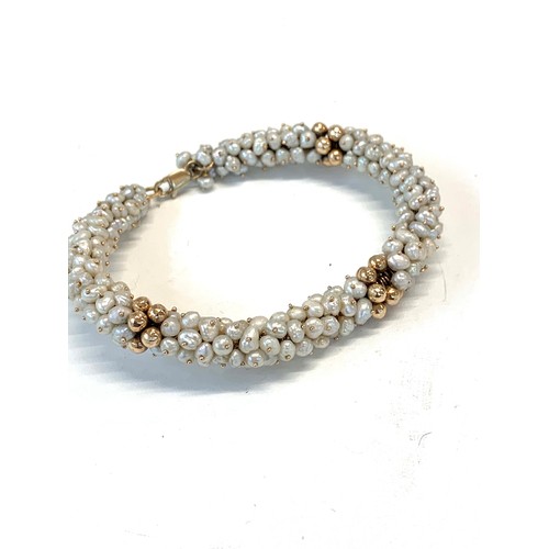 119 - 9ct Gold clasp and bead fresh water pearl bracelet