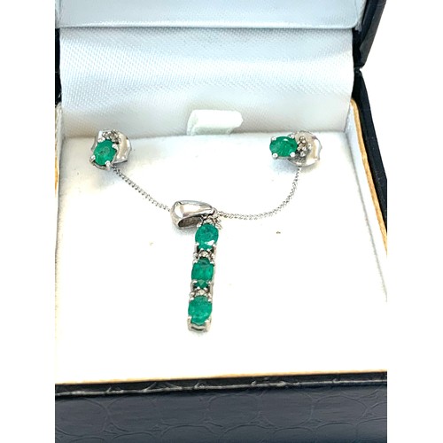 210 - Silver emeralds set earrings and pendant