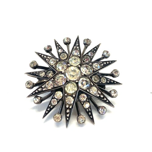 148 - Antique silver paste starburst brooch