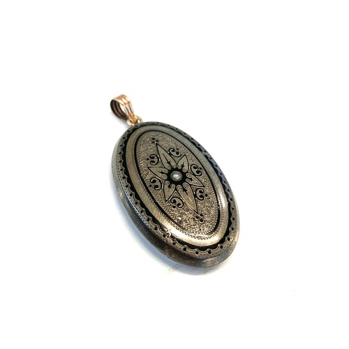 128 - Vintage silver and gold back locket