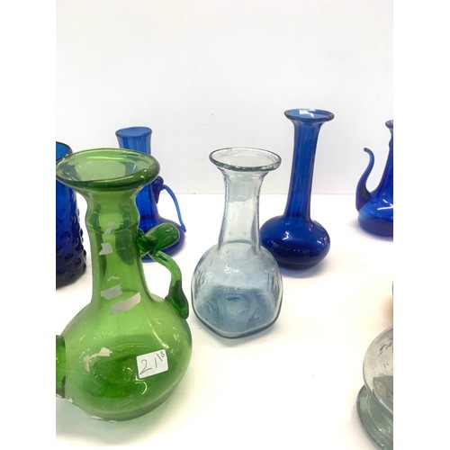 340 - A collection of 8 18th /19th century Indo Persian blown glass objects ewers and bottles please see i... 