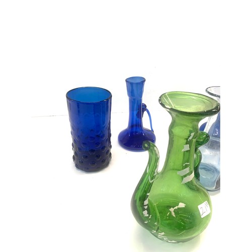 340 - A collection of 8 18th /19th century Indo Persian blown glass objects ewers and bottles please see i... 