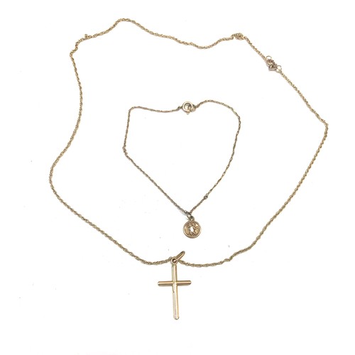 125 - 9ct Gold cross on chain and a St Christopher bracelet total weight approx 4.4g