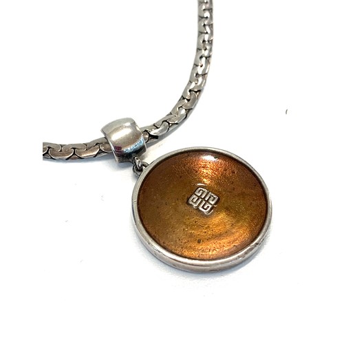 147 - Givenchy silver pendant and chain