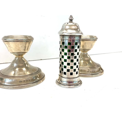 10 - Pair of silver squat candlesticks and silver salt