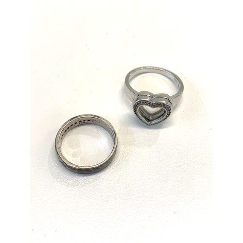 157 - 2 Silver and diamond dress rings