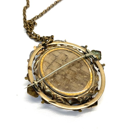 208 - Victorian swivel pendant locket brooch on gold plated chain