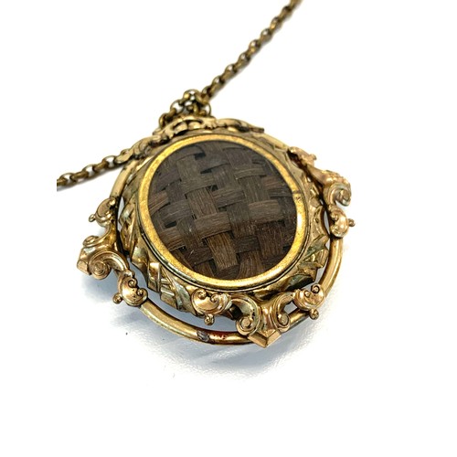 208 - Victorian swivel pendant locket brooch on gold plated chain