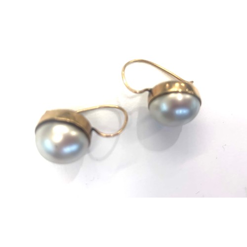 196 - 18ct Gold pearl earrings