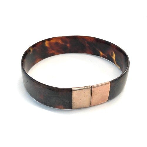 145 - Victorian tortoiseshell bangle gold clasps