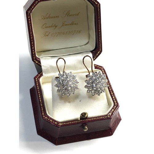 152 - 9ct cz cluster earrings