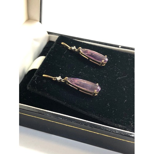 172 - 9ct Gold amethyst and diamond accent drop earring,