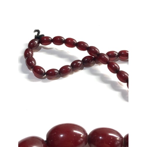 156 - Cherry amber bakelite bead necklace 52g no internal streaking