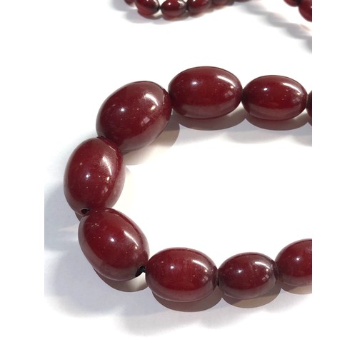 156 - Cherry amber bakelite bead necklace 52g no internal streaking