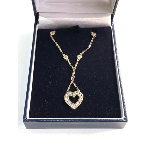 57 - 9ct gold CZ heart necklace