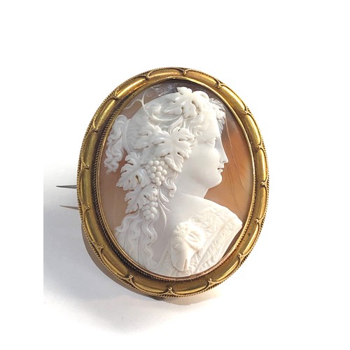 245 - Large 18ct gold framed Bacchus cameo brooch measures approx 64mm by 55mm stress cracks to cameo tota... 