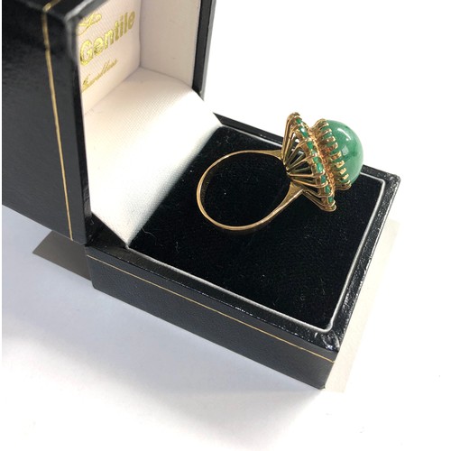 84 - 18ct Gold green gemstone cocktail ring, weight approx 3g ring size approx o/p