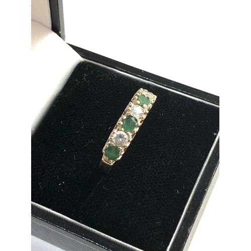 75 - 9ct gold emerald cz ring